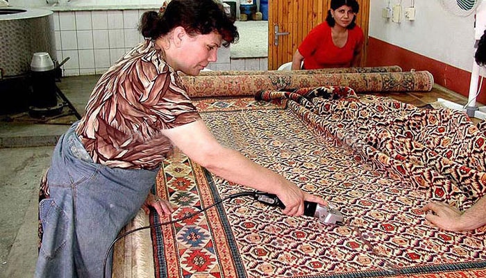 Acabado en la elaboración de alfombras