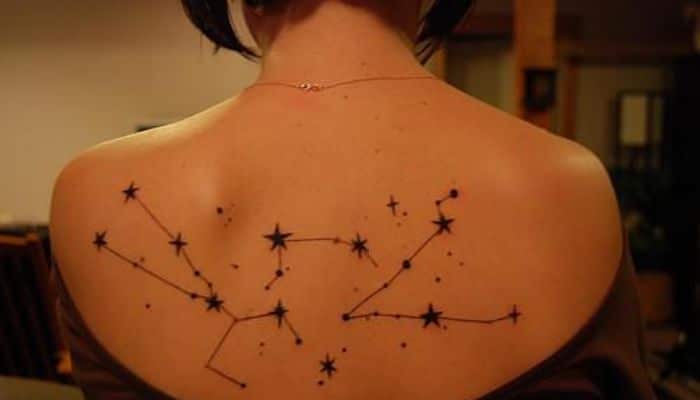 Tatuajes de estrellas en la espalda