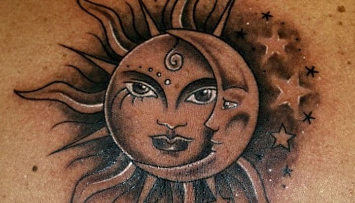 Tatuajes del sol en la espalda