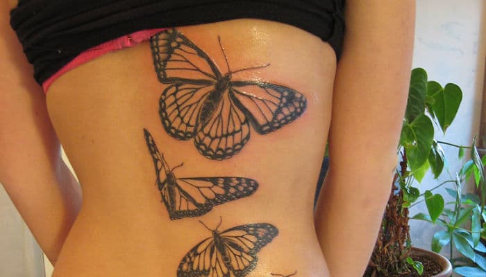Tatuajes de mariposa en la espalda